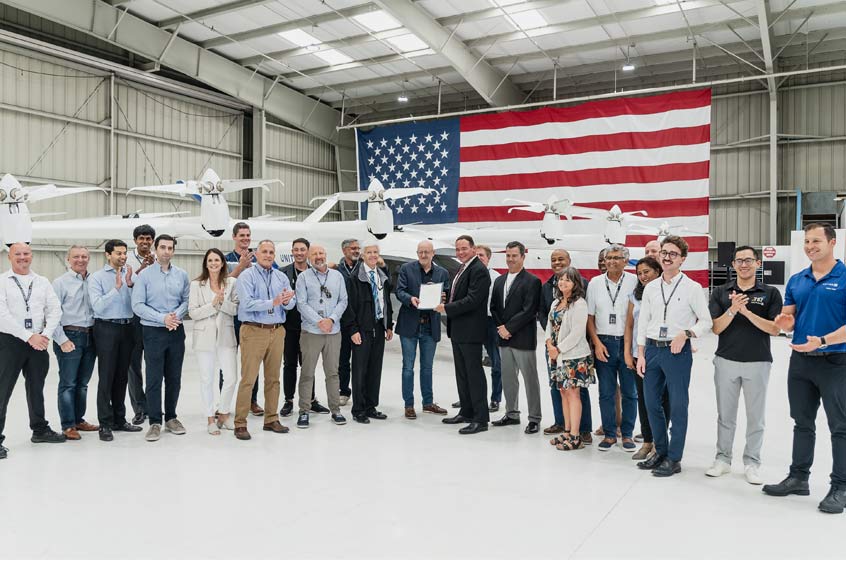 The FAA presenting Archer’s airline team and representatives from United Airlines with Archer’s Part 135 certificate. 
