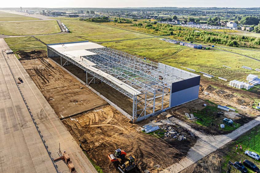 Construction of a major hangar project progress at Katowice airport in Poland.