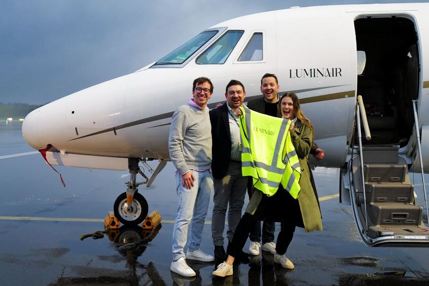 David Bergold, Algernon Trotter, Alexander Stevens and Julia Feddern in front of their first aircraft, a Cessna Citation XLS.