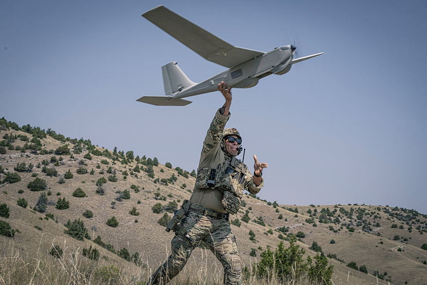 A soldier hand-launches the Puma 3 AE, equipped with advanced GPS-denied capabilities, ensuring mission continuity in contested environments.