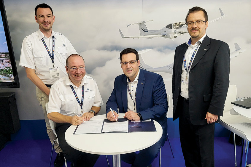 Thomas Schindler, Head of Flight Training AAA; Oliver Karall, CEO AAA; Christian Schmid, Sales Manager Diamond Aircraft; Anton Chirkovski, Head of Civil Sales, Diamond Aircraft, sign a contract for a new Diamond Aircraft Simulator at EATS 2025, Cascais, Portugal, November 5, 2025.