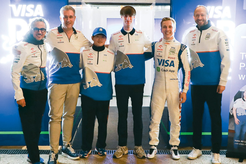 Laurent Mekies, team principal of VCARB; Daniel Rudas, general manager and COO of Hahnair; Yuki Tsunoda, VCARB official driver; Joshua Carrera-Sondermann, F/O and F1 project manager, Hahnair; Liam Lawson, VCARB official driver; and Peter Bayer, CEO of VCARB.